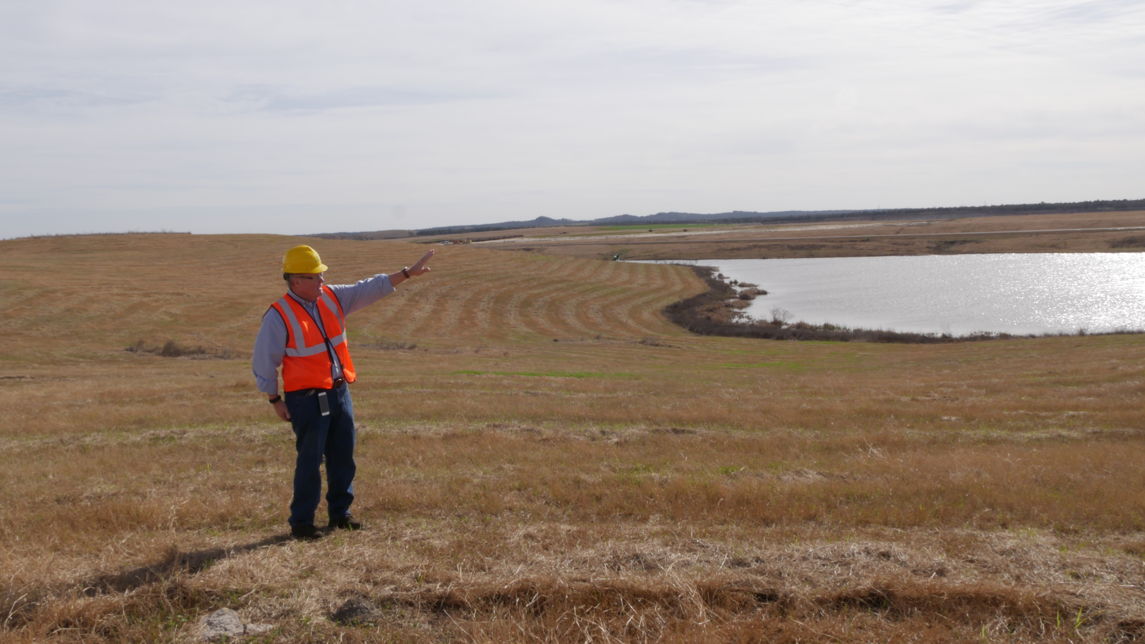 Commissioner Christian enjoys view of reclaimed surface mining site.