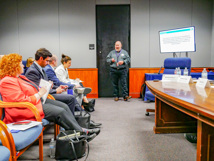 Scott Sroufe, Director, Office of Public Engagement provides an overview to members of a Canadian business delegation visiting Austin, October 22, 2025.